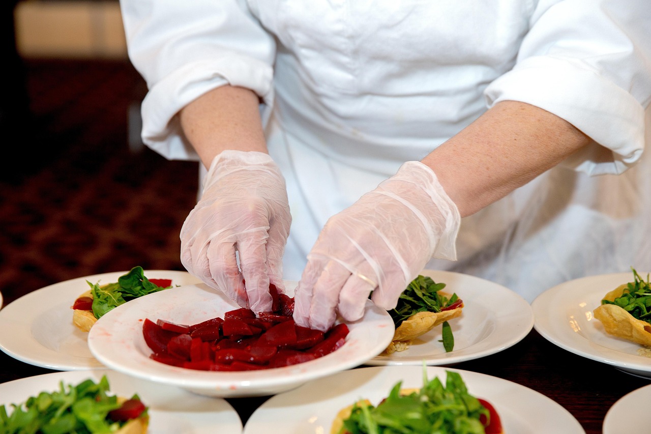 A team of restaurant chefs working together in a professional kitchen
